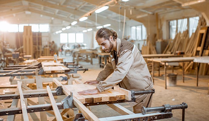 A carpenter is working on a construction site