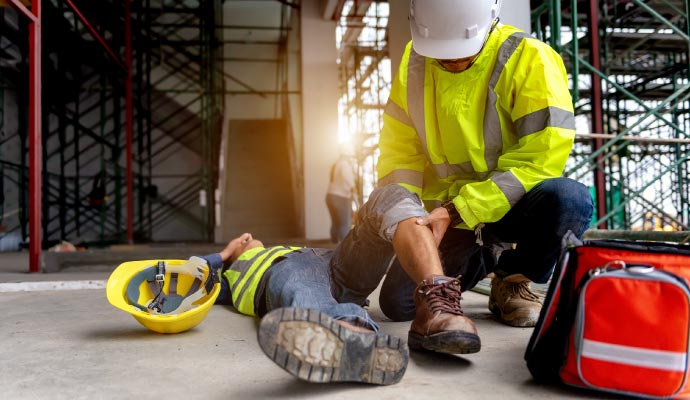 injured worker at construction site