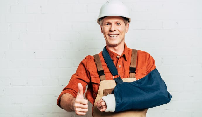 a happy injured worker after treatment